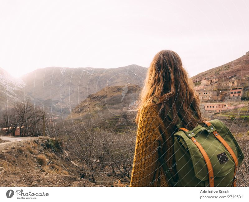 Female tourist with backpack Tourist Backpack Woman Village Vacation & Travel residential Tourism Culture Monument traveler Destination Architecture Landmark