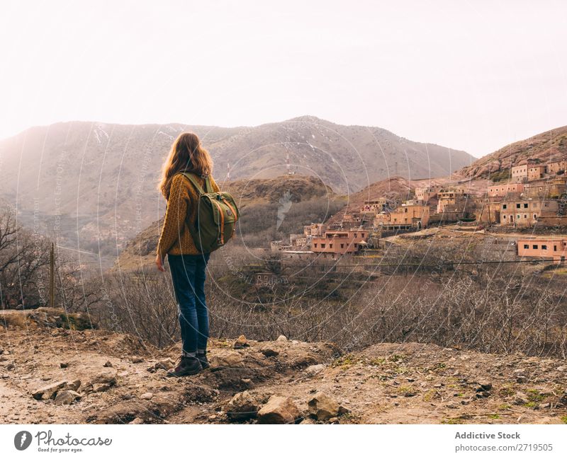 Female tourist with backpack Tourist Backpack Woman Village Vacation & Travel residential Tourism Culture Monument traveler Destination Architecture Landmark