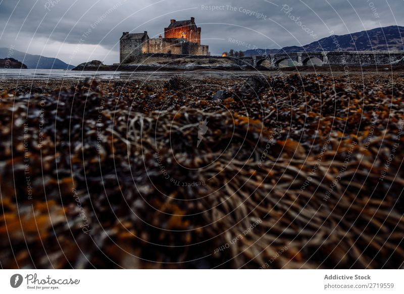 Coast and castle in mountains Castle Rock Lake Hill Mountain Landscape Nature Water Natural Old Historic mansion House (Residential Structure) Stone Beautiful