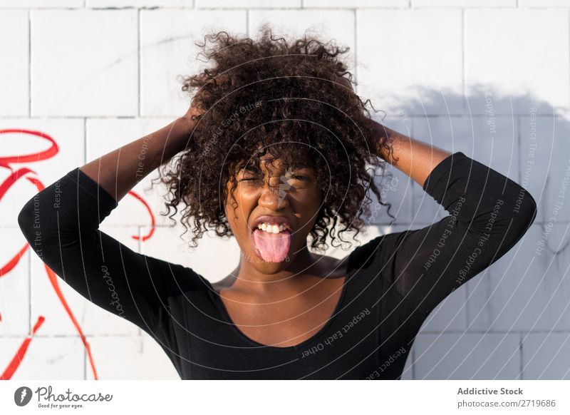 Ethnic woman making faces Woman pretty Beautiful Youth (Young adults) Portrait photograph grimacing Human being Attractive Curly Black Face