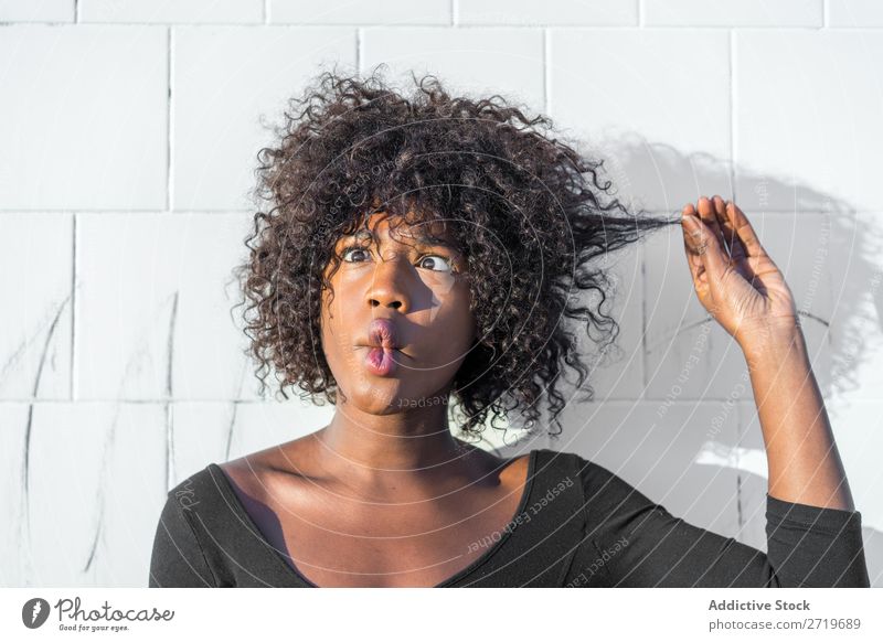 Ethnic woman making faces Woman pretty Beautiful Youth (Young adults) Portrait photograph grimacing Human being Attractive Curly Black Face