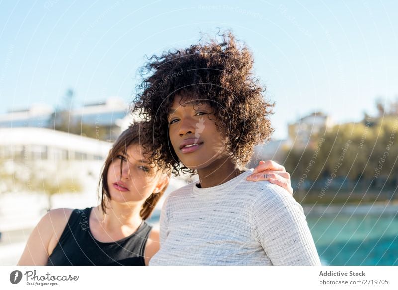 Cheerful women standing on street together Woman pretty Beautiful Youth (Young adults) Pond Park Looking into the camera Cool (slang) City Town Style