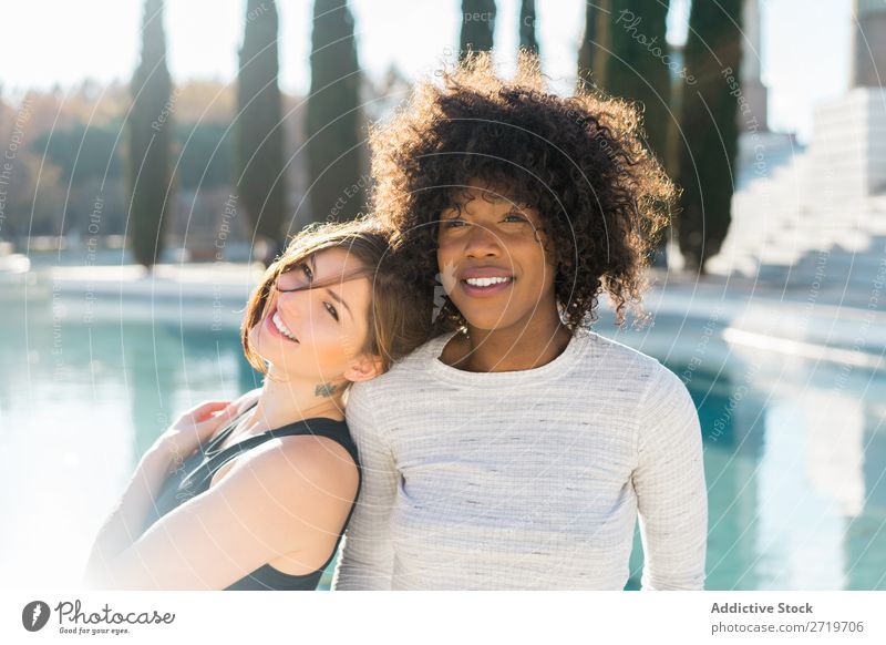 Cheerful women standing on street together Woman pretty Beautiful Youth (Young adults) Pond Park Cool (slang) City Town Style Portrait photograph Human being