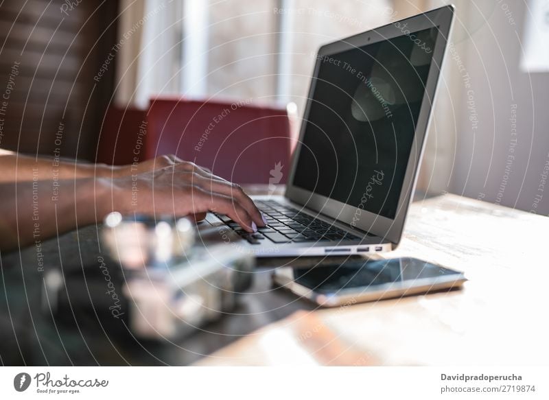 Woman hands working from home on her computer Crops Unrecognizable Business Ethnic Anonymous Faceless Communication Typing Hand Computer Cellphone PDA