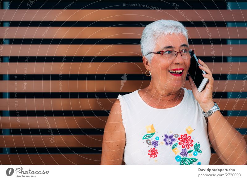 Happy elderly woman on the mobile phone Woman grey hair Old Cellphone PDA Technology Portrait photograph Beauty Photography Communication Cheerful retired