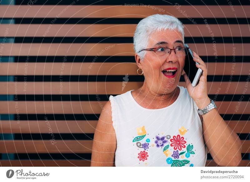 Happy elderly woman on the mobile phone Woman grey hair Old Cellphone PDA Technology Portrait photograph Beauty Photography Communication Cheerful retired