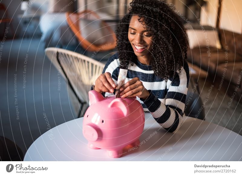 Black woman with saving piggy bank Woman Money box savings Success Business cash Coin pound sterling Beautiful Happy Cheerful investment wealth Budget