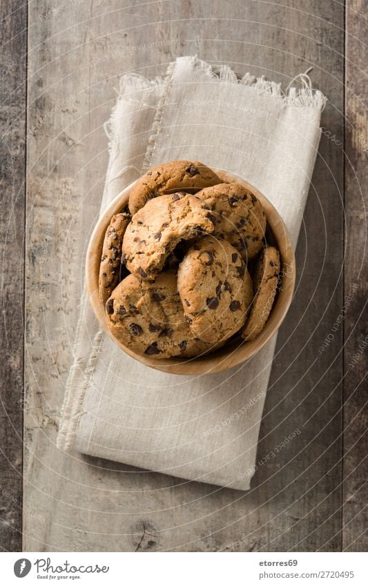 Chocolate cookies on wooden table. Chocolate chip cookies Cookie Confectionary Baking Brown Token Sugar Sweet Candy Dessert Food Healthy Eating Food photograph