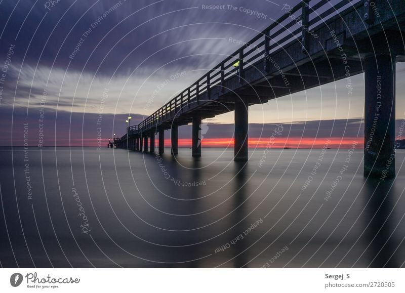 Sea bridge at dawn Vacation & Travel Far-off places Beach Ocean Baltic Sea Binz Germany Deserted Wood Steel Stand Large Long Maritime Violet Orange Horizon