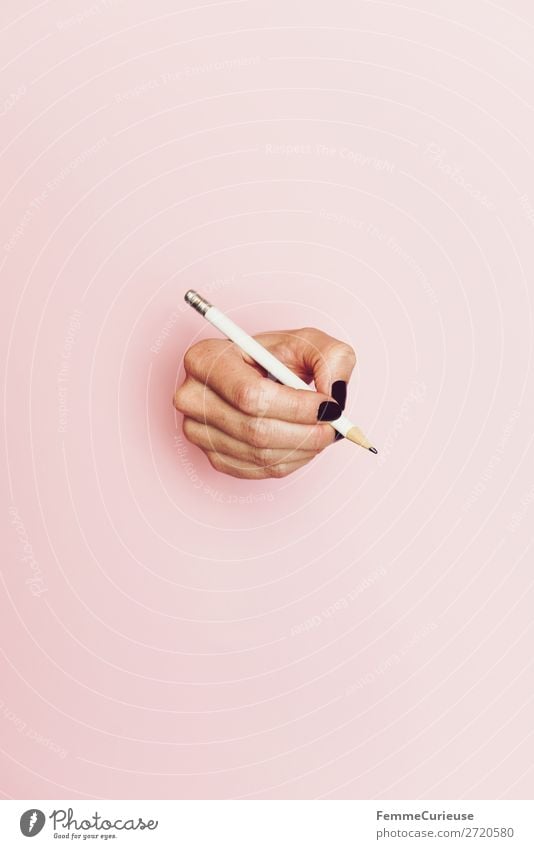 Hand of a woman holding a pencil Feminine 1 Human being Creativity Write Draw Pencil Pink Design Colour photo Studio shot Copy Space left Copy Space right