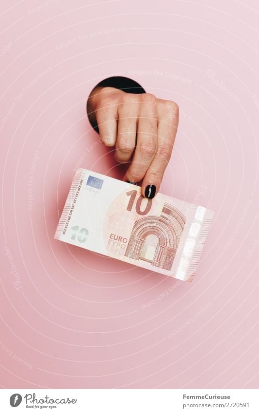 Hand of a woman holding a 10 Euro note Feminine Human being Financial Industry € Money Bank note Paying Save Pink To hold on Means of payment Colour photo