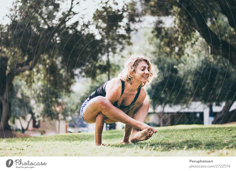 Smiling caucasian woman performing yoga shoulder pressing pos Lifestyle Beautiful Body Health care Harmonious Relaxation Calm Meditation Summer Sports Yoga