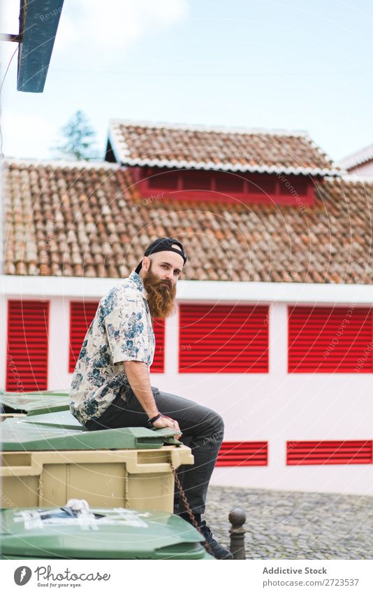 Bearded man sitting on dumpster Man City Street Sit bearded Trash container Container Lifestyle Youth (Young adults) Town Human being Guy Cool (slang) Style