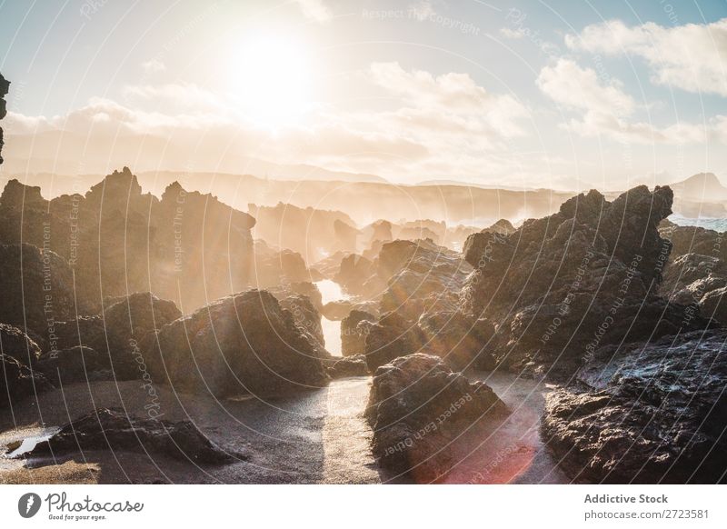 closeup of some rocks on the beach Beach Rock Water Blue Lake Sky Colour Ocean Wave White Nature Sunset Pattern Stone Background picture Deserted Clouds Round