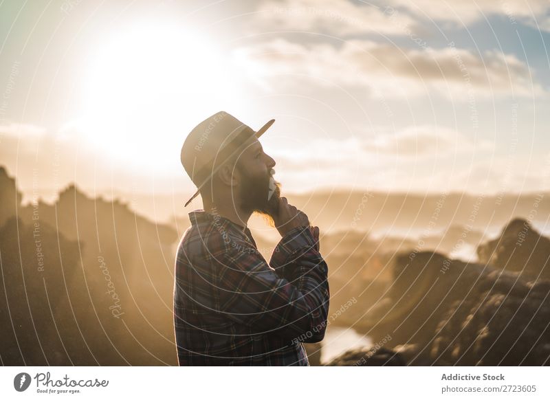 Tourist standing on cliff in sunny day Nature Man bearded Hill Cliff Mountain Sunset Evening Silhouette Vacation & Travel Adventure Landscape Azores Hiking