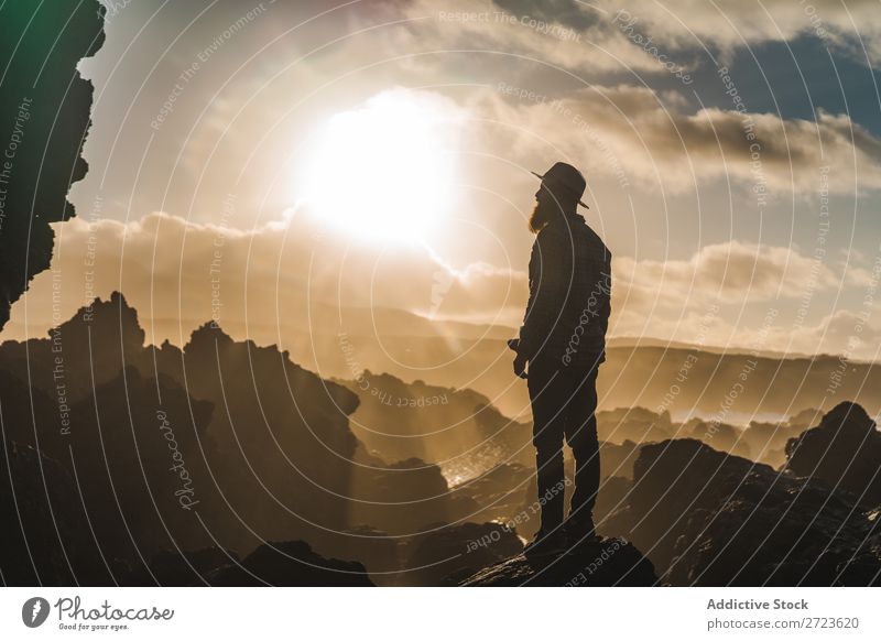 Tourist standing on cliff in sunny day Nature Man bearded Hill Cliff Mountain Sunset Evening Silhouette Vacation & Travel Adventure Landscape Azores Hiking