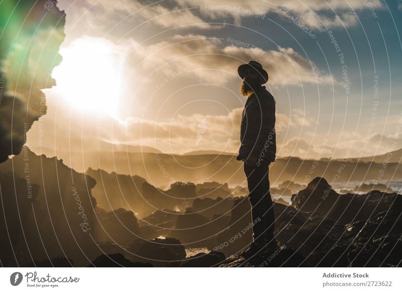 Tourist standing on cliff in sunny day Nature Man bearded Hill Cliff Mountain Sunset Evening Silhouette Vacation & Travel Adventure Landscape Azores Hiking