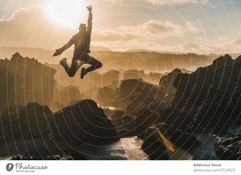 Tourist standing on cliff in sunny day Nature Man bearded Hill Cliff Mountain Sunset Evening Silhouette Vacation & Travel Adventure Landscape Azores Hiking