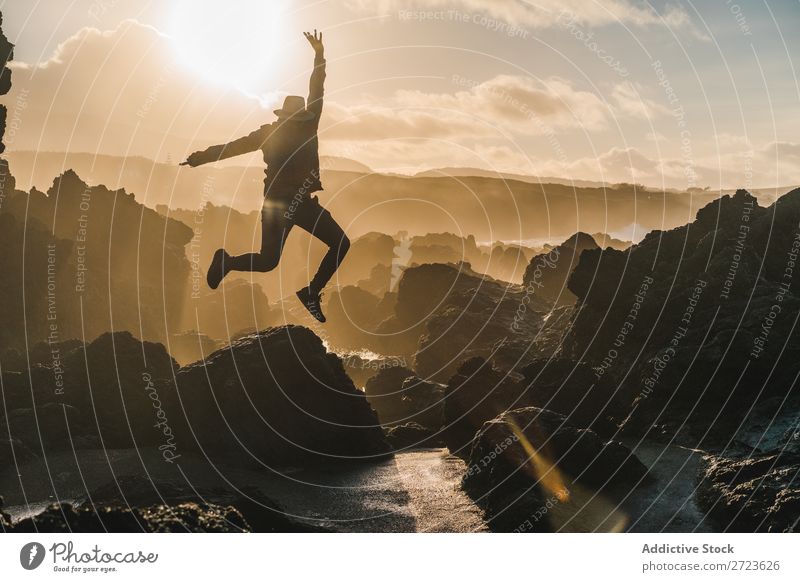 Tourist standing on cliff in sunny day Nature Man bearded Hill Cliff Mountain Sunset Evening Silhouette Vacation & Travel Adventure Landscape Azores Hiking