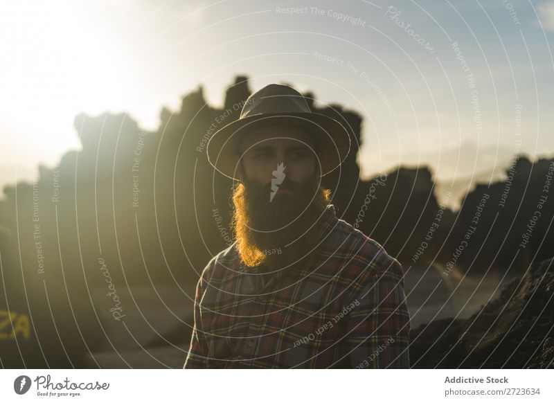 Tourist standing on cliff in sunny day Nature Man bearded Hill Cliff Mountain Sunset Evening Silhouette Vacation & Travel Adventure Landscape Azores Hiking