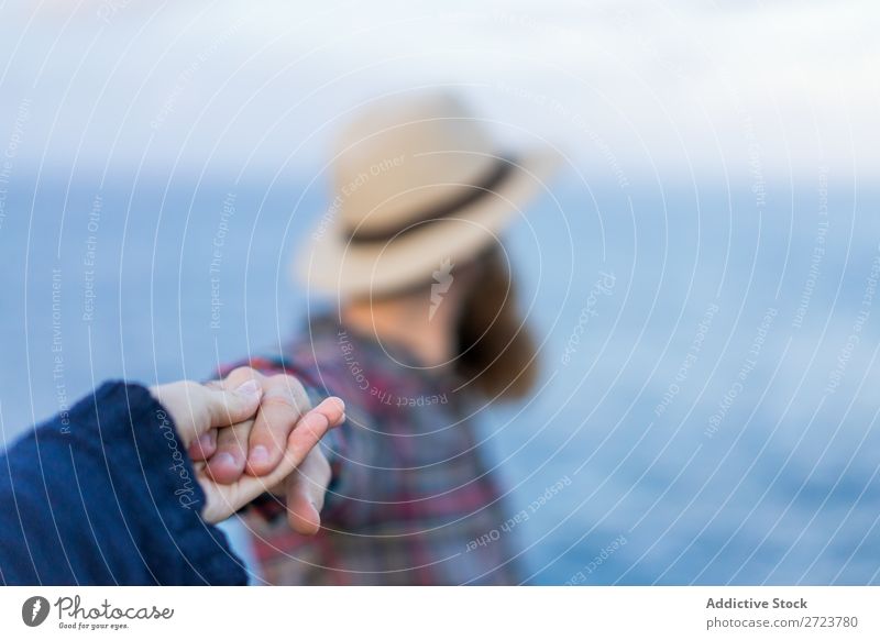 Man holding hands at seaside Tourist Nature bearded Hat Love follow me Gesture Ocean Vacation & Travel Adventure Azores Landscape Hiking Exterior shot