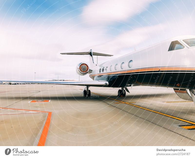 Private luxury jet at the airport terminal Jet Luxury Aviation business class Exclusive Airport Aircraft Airplane Clouds Business Transport Sky Story Runway