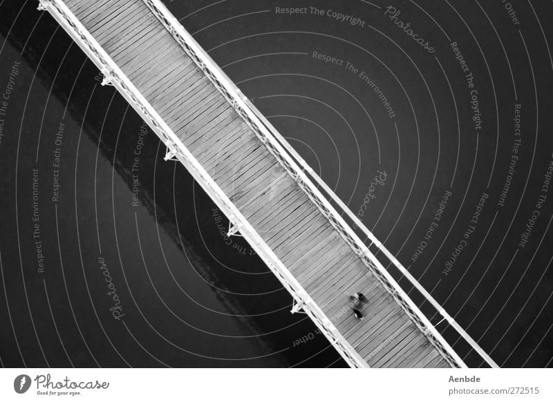 from bottom right to top left.... Human being 1 Bridge River Wooden bridge Black & white photo Exterior shot Contrast Bird's-eye view Dark background Diagonal