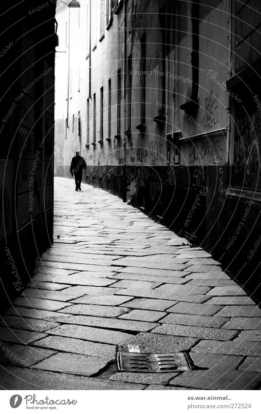 Who's afraid of the black man? Masculine 1 Human being Dark Alley Black & white photo Exterior shot