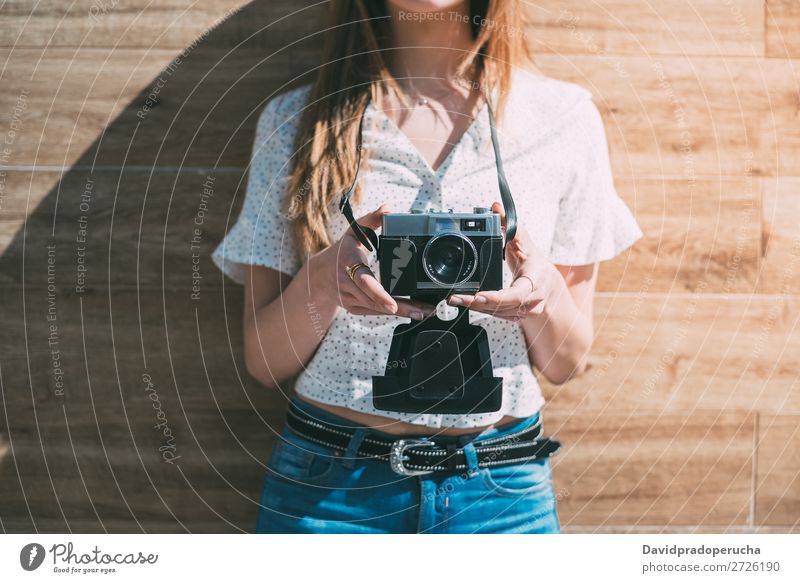 Cropped woman with vintage old camera Vintage Camera Retro Woman Old Youth (Young adults) Partially visible reel Anonymous Unrecognizable Portrait photograph