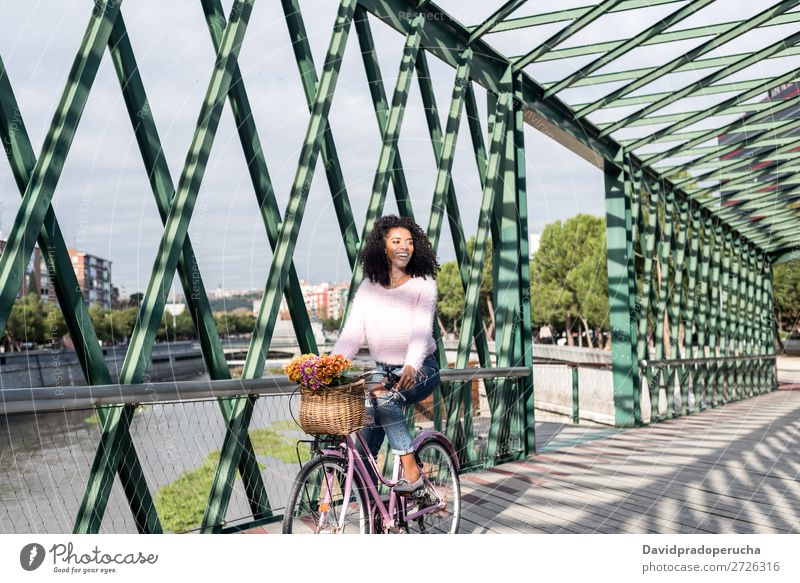 Black young woman riding a vintage bicycle Bicycle Girl Woman Vintage Ride Beautiful Retro Flower Happy Bouquet Summer Youth (Young adults) pretty Spring Basket