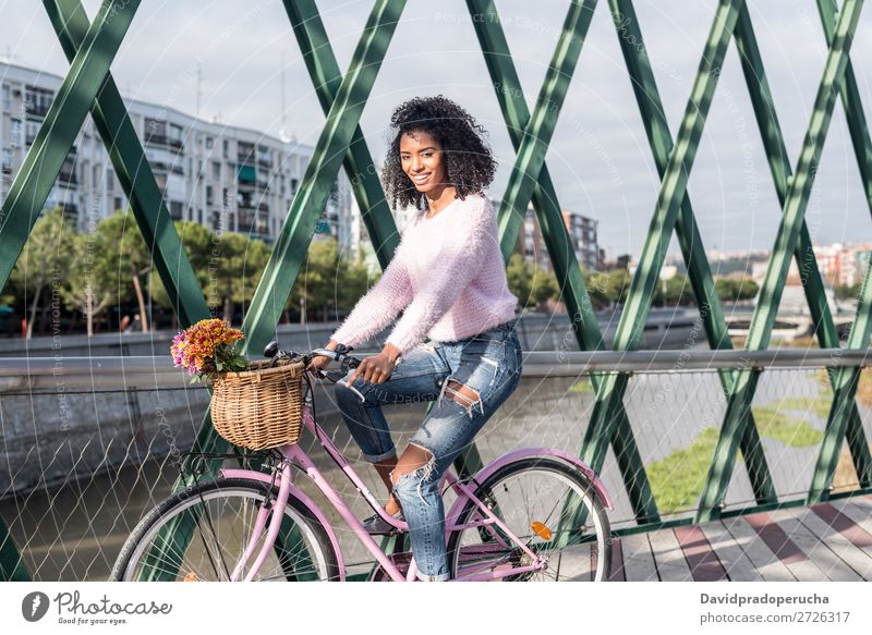 Black young woman riding a vintage bicycle Bicycle Girl Woman Vintage Ride Beautiful Retro Flower Happy Bouquet Summer Youth (Young adults) pretty Spring Basket