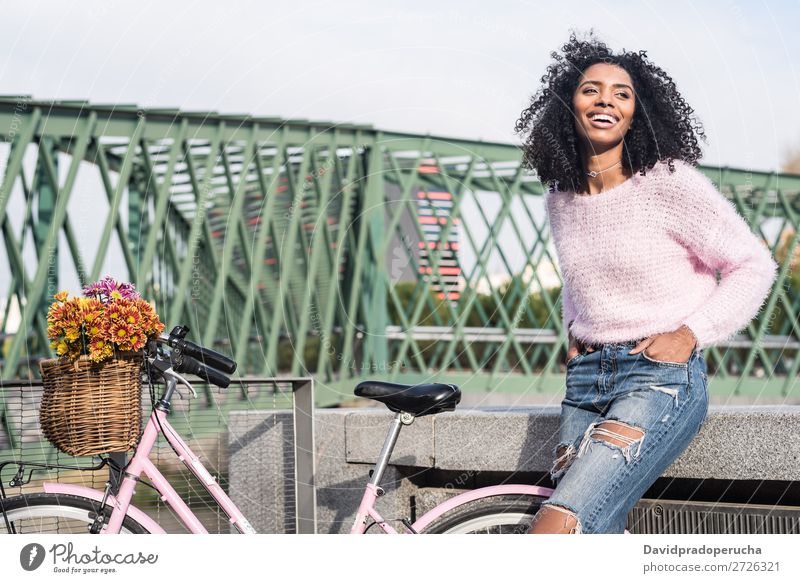 Black young woman riding a vintage bicycle Bicycle Girl Woman Vintage Ride Beautiful Retro Flower Sunbeam Happy Bouquet Summer Youth (Young adults) pretty