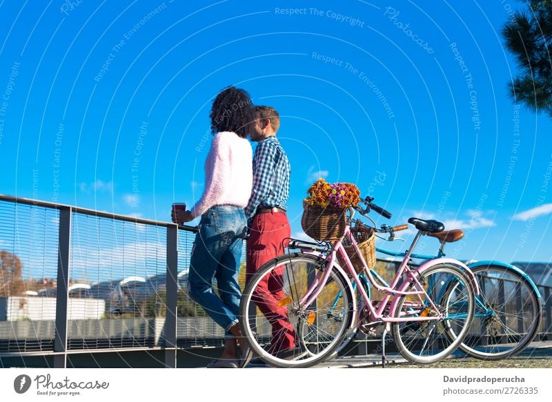 Happy young interracial couple by the river with their vintage bicycles Bicycle Couple Girl Boy (child) Love romantic Beautiful Retro Woman Man Relationship