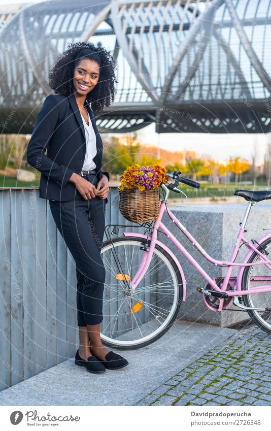 Business black woman with vintage bicycle Bicycle Cycling Vintage Woman Black Mixed race ethnicity City Youth (Young adults) Human being Suit Street Hair