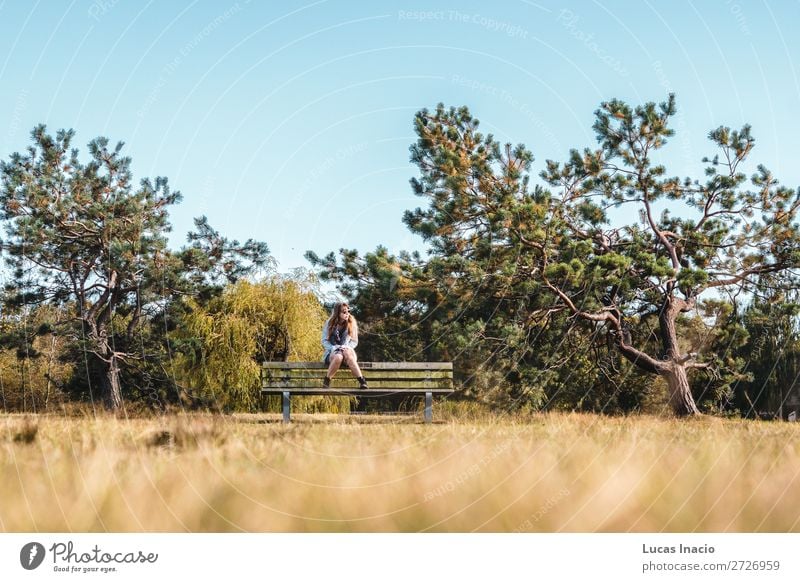 Girl on a bench at Vanier Park in Vancouver, Canada Summer Garden Woman Adults Environment Nature Sky Tree Grass Leaf Forest Skyline Sunglasses Blonde