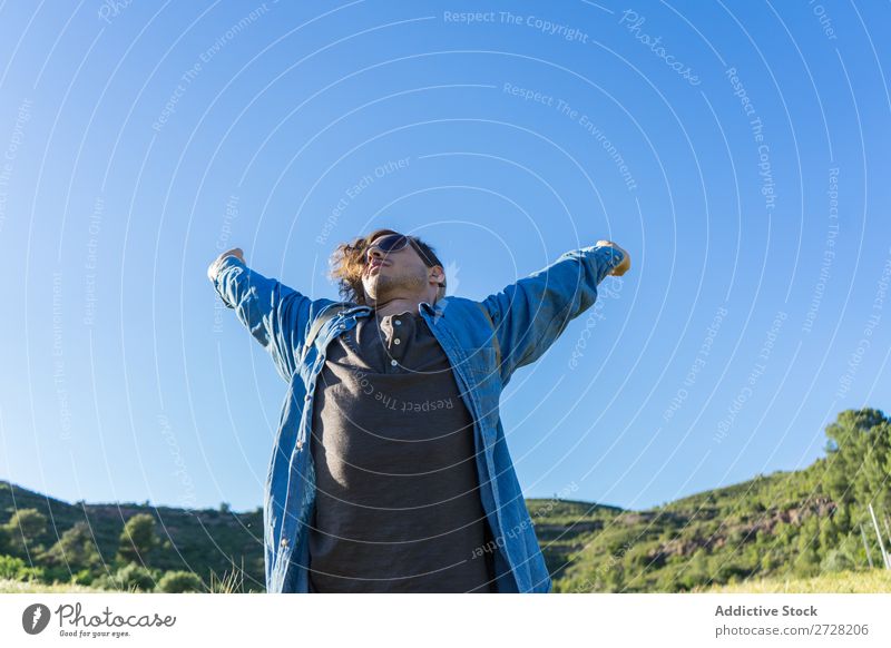 Cheerful man with backpack on nature Man backpacker Style Portrait photograph Adventure Vacation & Travel Modern Tourist Hipster Summer Self-confident