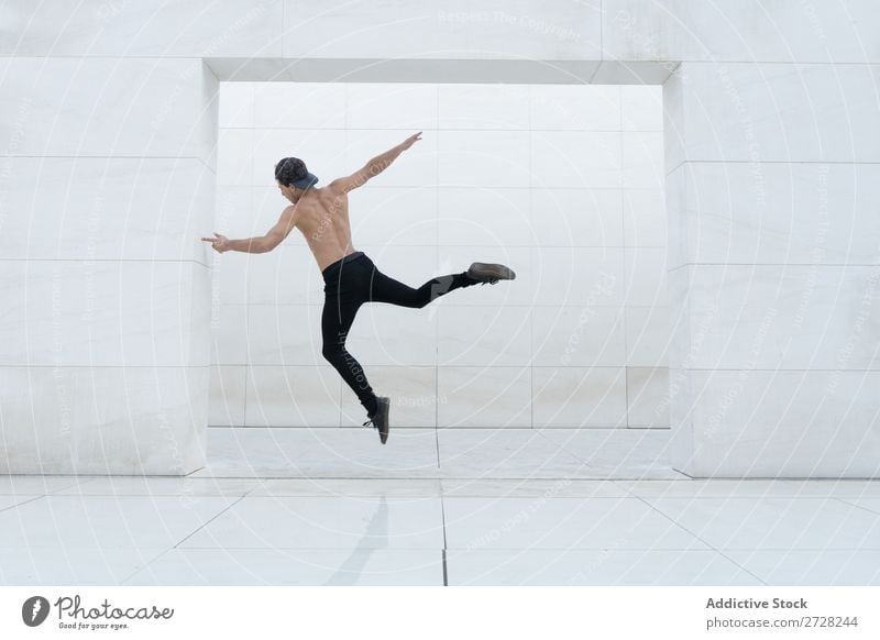 Shirtless man in jump Man Jump Studio shot Sports Modern Action Breakdance Dancer Freedom Entertainment Expression Youth (Young adults) Model Posture Energy