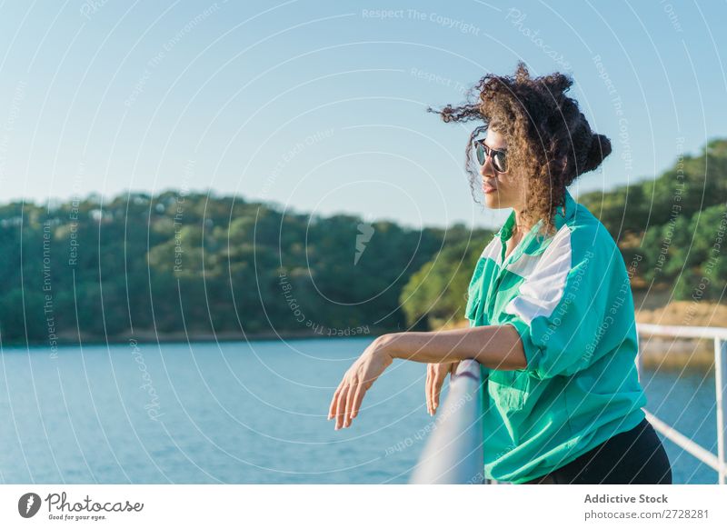 Beautiful woman on pier Woman Jetty Water Nature Youth (Young adults) Summer Ocean Sky Vacation & Travel Relaxation Lake Leisure and hobbies Human being