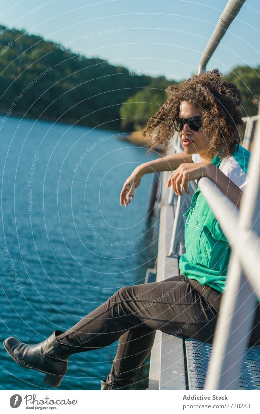 Beautiful woman on pier Woman Jetty Water Nature Youth (Young adults) Summer Ocean Sky Vacation & Travel Relaxation Lake Leisure and hobbies Human being