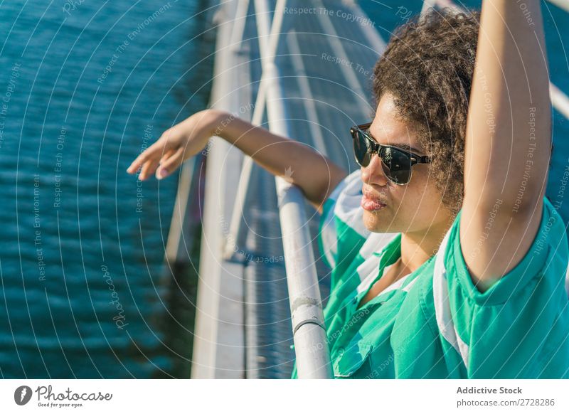 Beautiful woman on pier Woman Jetty Water Nature Youth (Young adults) Summer Ocean Sky Vacation & Travel Relaxation Lake Leisure and hobbies Human being