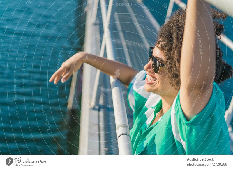 Beautiful woman on pier Woman Jetty Water Nature Youth (Young adults) Summer Ocean Sky Vacation & Travel Relaxation Lake Leisure and hobbies Human being