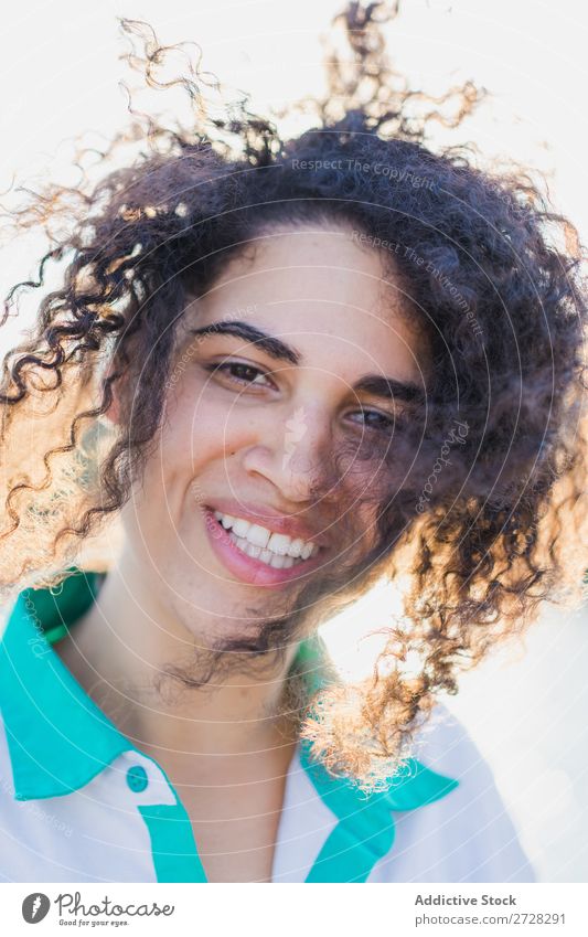 Curly woman posing on nature in sunlight Woman Summer To enjoy Posture human face Landscape Nature Colour Portrait photograph tranquil Exterior shot Countries