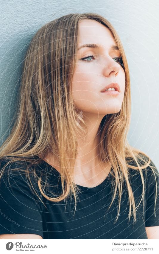 Close up portrait of a beautiful young woman Woman Blonde Portrait photograph Considerate Face Girl Loneliness White Sadness Black Smiling Beautiful