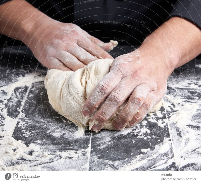 baker kneads white wheat flour dough Dough Baked goods Bread Nutrition Table Kitchen Work and employment Cook Man Adults Hand Wood Make Fresh Black White