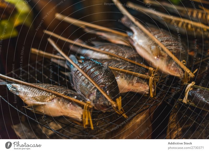 Uncooked fish on skewers Fish Raw Markets Fresh Healthy Ingredients Food Seafood Dinner Cooking Preparation Gourmet Meal Nutrition Delicious Tasty Natural