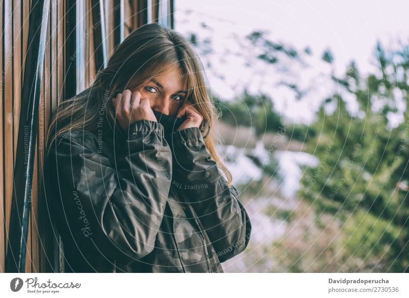 portrait Young pretty woman in winter in a log cabin in the snow Portrait photograph Winter Woman Snow Youth (Young adults) Happy Hut Log Wood Cute Blonde