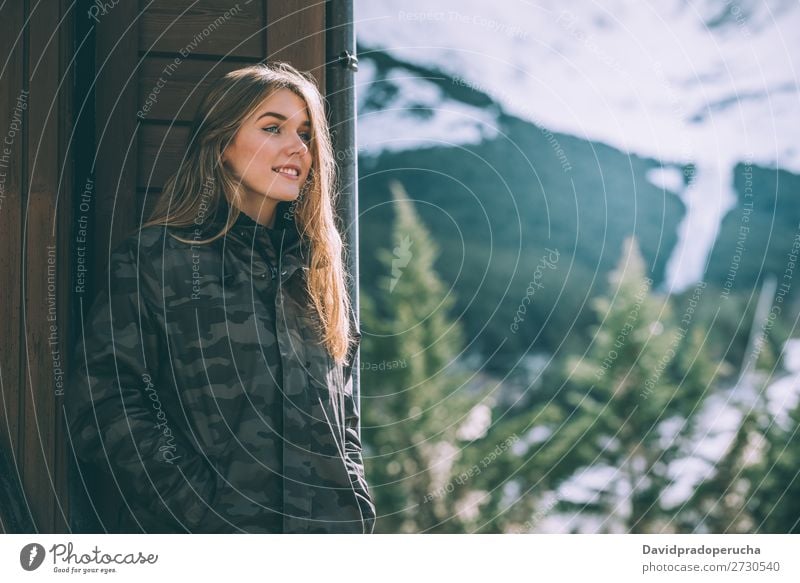 portrait Young pretty woman in winter in a log cabin in the snow Portrait photograph Winter Woman Snow Youth (Young adults) Happy Hut Log Wood Cute Blonde