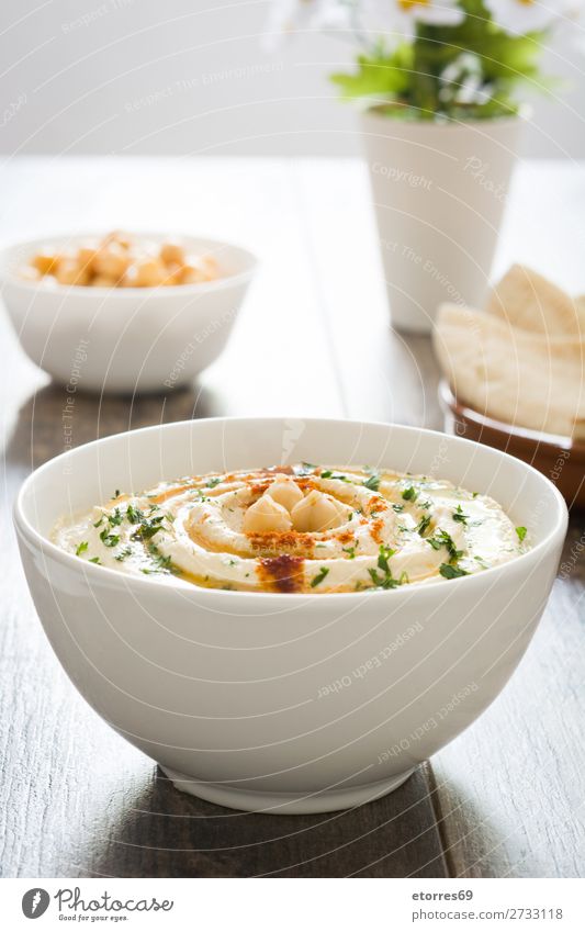 Hummus in bowl and pita bread Bread Food Healthy Eating Food photograph Dish Nutrition Chickpeas Coriander Lemon Olive oil Vegan diet Arabia tahini Bowl Dip