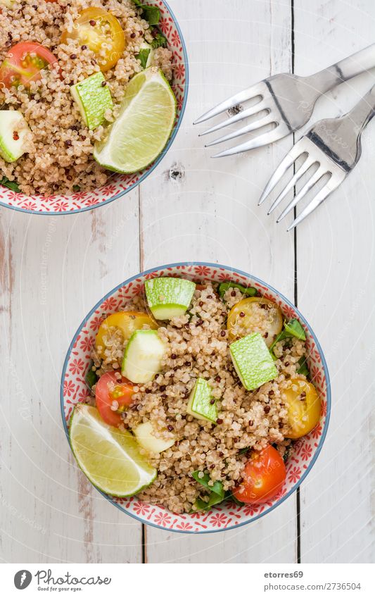 Quinoa bowl with tomatoes, zucchini and lime quinoa Vegan diet Vegetable Tomato Spinach Bowl Healthy Eating Diet Heap Grain Agriculture Preparation Crunchy