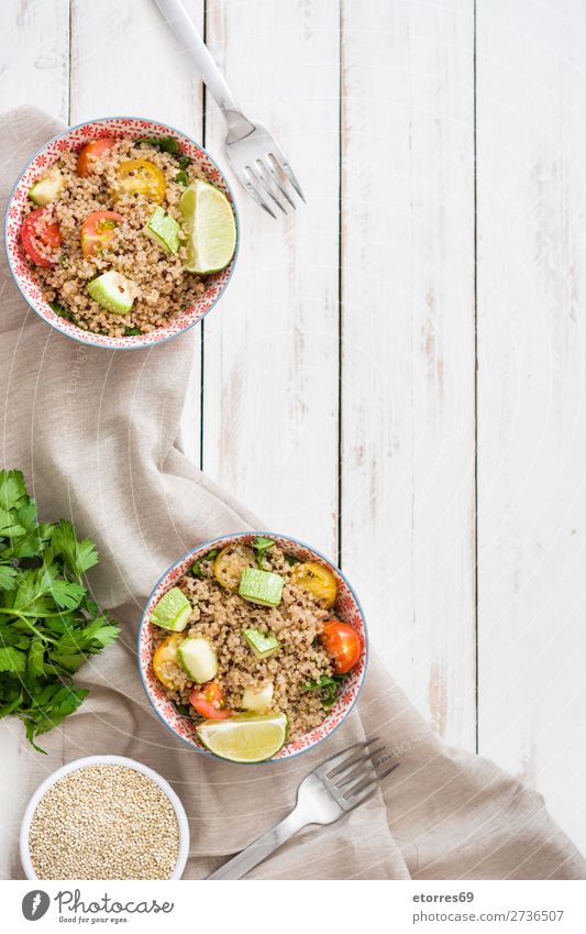 Quinoa with tomatoes, zucchini and lime quinoa Vegan diet Vegetable Tomato Spinach Bowl Healthy Healthy Eating Diet Heap Grain Agriculture Preparation Crunchy